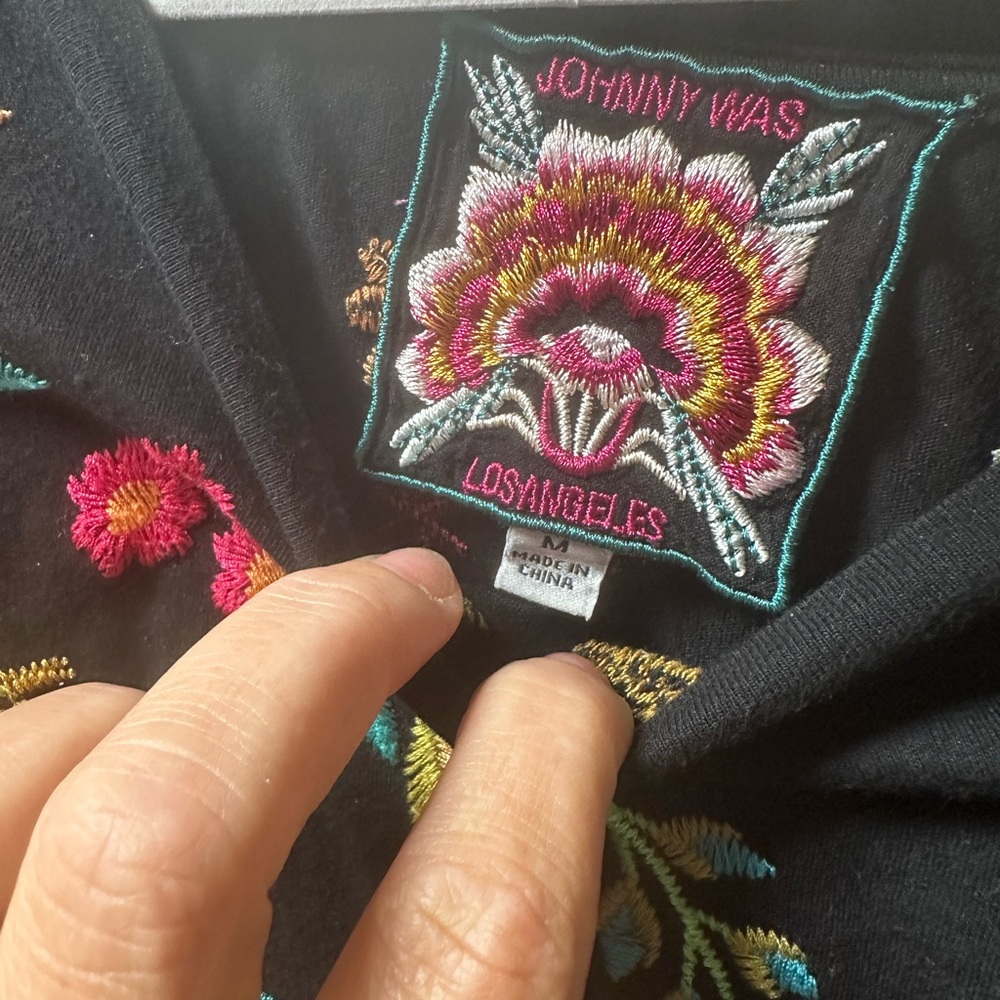 Johnny was shorter sleeve top with beautiful embroidery